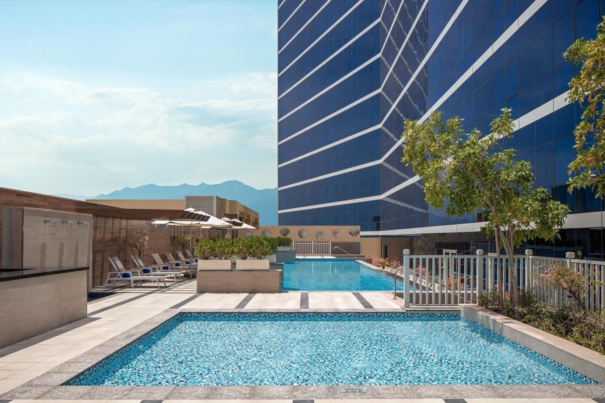 Doubletree By Hilton Fujairah City Exterior photo The swimming pool